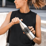 aluminum-bottle-mockup-featuring-a-woman-with-a-ponytail-33501